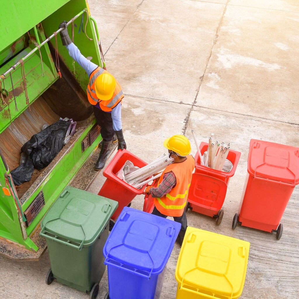workers-collect-garbage-with-garbage-collection-truck-garbage-collection-workers-residential-area-1_2